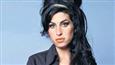 Amy Winehouse statue unveiled in London