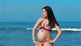 Celina Jaitly flaunts her baby bump in bikini!