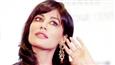 Is Chitrangada trying to show off her new earrings?