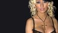 Christina Aguilera poses topless