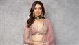 Karishma Tanna looks festive and all set for a blasting Diwali in a pastel pink lehenga!