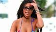 Kourtney Kardashian strikes seductive pose