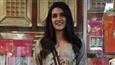 Marking highest opening, Kriti Sanon distributes Bareilly Ki Barfi