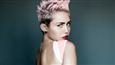 Miley Cyrus posts new topless pictures online