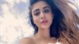 Mouni Roy allures viewers in a white ruffled dress