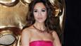 Myleene Klass flaunts washboard abs in tiny bikini