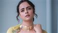 Prachi Tehlan dons yellow as she begins with Mamangam promotions; seeks blessings at a temple