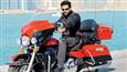 Prithviraj hops on a bike to meet Rishi Kapoor