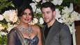 Priyanka - Nick look resplendent at their Mumbai reception!