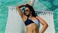 Rakulpreet Singh ravishingly chill on the hammock by the beach!