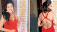 Rituparna stands out in a backless red dress