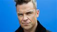 Robbie Williams starves to lose weight