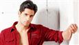 Why doesn't Sidharth want to fit into his clothes?