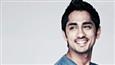 Siddharth makes fun of  Karan Johar, apologises