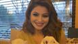 Urvashi Rautela looks pizzazz and bewitching in a golden gown playing along with adorable cubs!