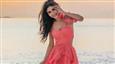 Mouni Roy Inspires Beach Vacation Fashion Trends with Stunning Outfits!