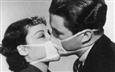 A Kiss Through The Medical Masks