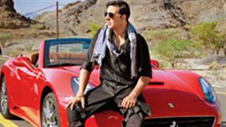 Akshay invites you for a Long Drive in his Red Ferrari!