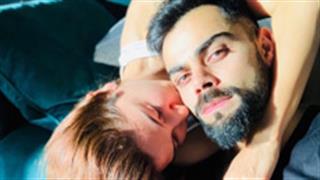 Anushka Sharma catches her husband Virat Kohali diligently cleaning his muddy spikes!