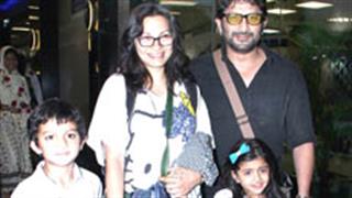 Arshad visits church for son's communion