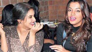 What are Asin and Mugdha Godse laughing about?