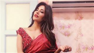 Chitrangada Singh redefines a saree with a slit and furry belt