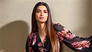 Diana Penty takes our heart away in a classy, floral black dress and sleek straight hair look!