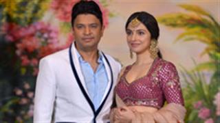 Bhushan Kumar and Divya Khosla Kumar make an impressive entry at Sonam Kapoor-Anand Ahuja's reception!