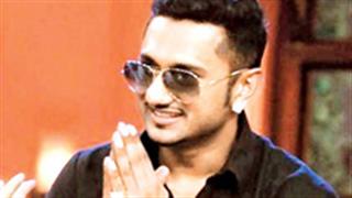 What's that on Honey Singh's arm?