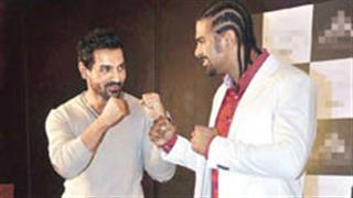 Spotted: John Abraham and British boxer David Haye