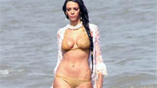 Hollywood star Judi Shekoni sizzles in a bikini shoot