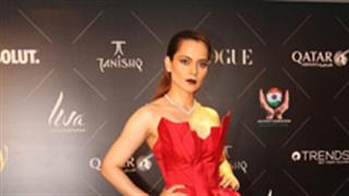 Kangana exudes elegance in fiery red strapless gown!