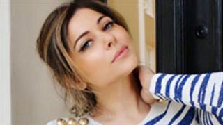 Kanika Kapoor looks firkin fabulous in her latest unconventional ensemble!