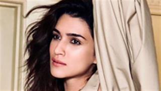 Kriti Sanon looking ethereal and ravishing in a puffed sleeve beige trench coat!