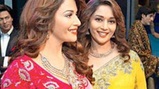 Why Madhuri Dixit smiles so much?