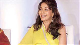 Who is he? Even at this age Madhuri has an admirer