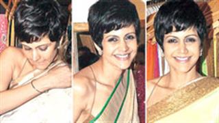 Flaunting Her Collection: Mandira changes 5 saris in 4 hours!