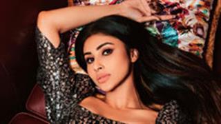Mouni Roy stirs up some heat in a hot and wild avatar draped in blingy timeless Alexandra dress!