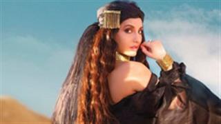 Nora Fatehi looks like a gorgeous white lily in desert-like ray of hope!