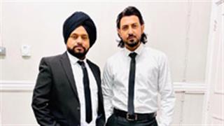Karamjit Anmol shares a still with Gippy Grewal in a changed avatar from the sets of 'Paani Ch Madhaani'!