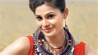 Pooja Gupta gets a gift from a local tribe in Kenya