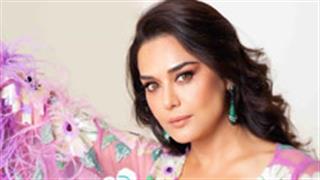 Preity G Zinta steals the hearts of her followers and fans in an enchanting, mauve, floral sheer dress!