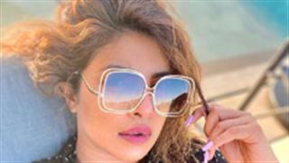 While flaunting her French-girl fringes, Priyanka Chopra says, 'Far be the evil eye'!