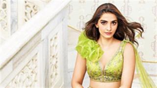 Sonam Kapoor leaves her fans in awe looking ornate and graceful in parrot green lehenga!