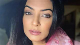 Sushmita Sen looks striking in an exotic pink saree with floral print!