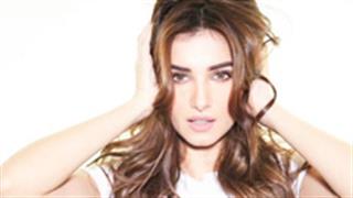 Tara Sutaria blames it on the boogie in the white and olive green chromatic ensemble!