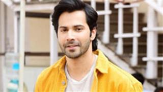 Varun Dhawan looks happening and vibrant in a bright Jacket!