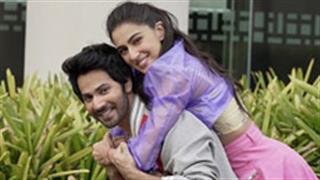 Sara Ali Khan and, Varun Dhawan strikes a cute and mischievous piggyback pose for the netizens, as they promote Coolie No. 1