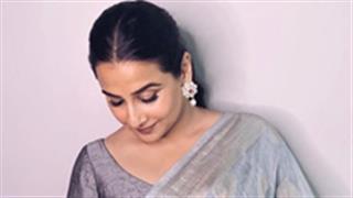 Vidya Balan looks like an epitome of elegance and style in grey saree
