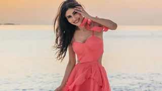 Mouni Roy Inspires Beach Vacation Fashion Trends with Stunning Outfits!